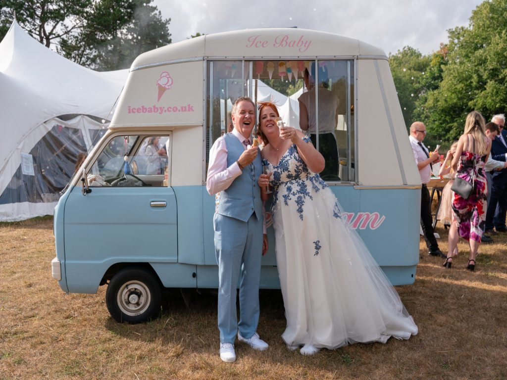 Wedding guests enjoying the Sadie Centre gardens