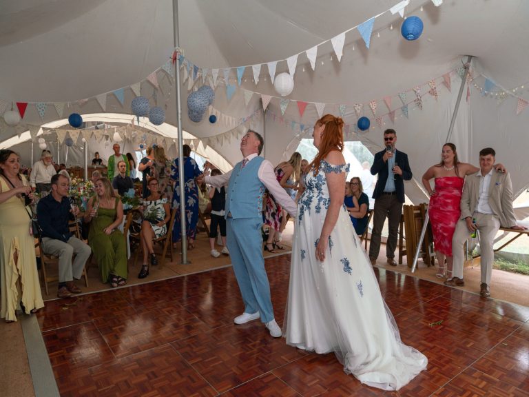 Joyful wedding moment in the Enchanted Gardens