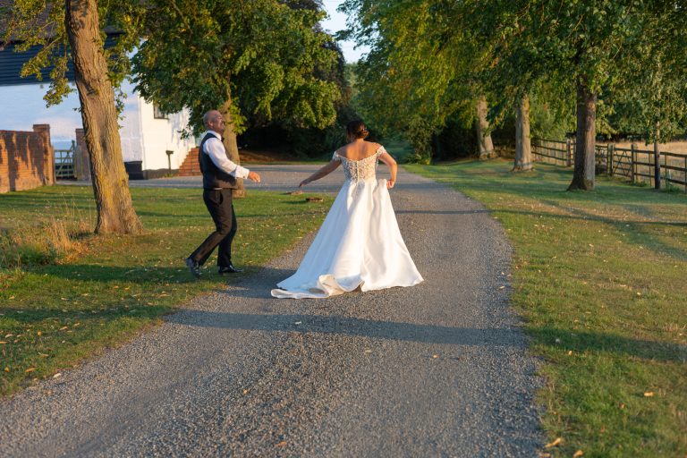 Couple walking the grounds at The Barns at Alswick