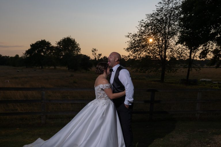 Couple at sunset in the grounds at The Barns at Alswick
